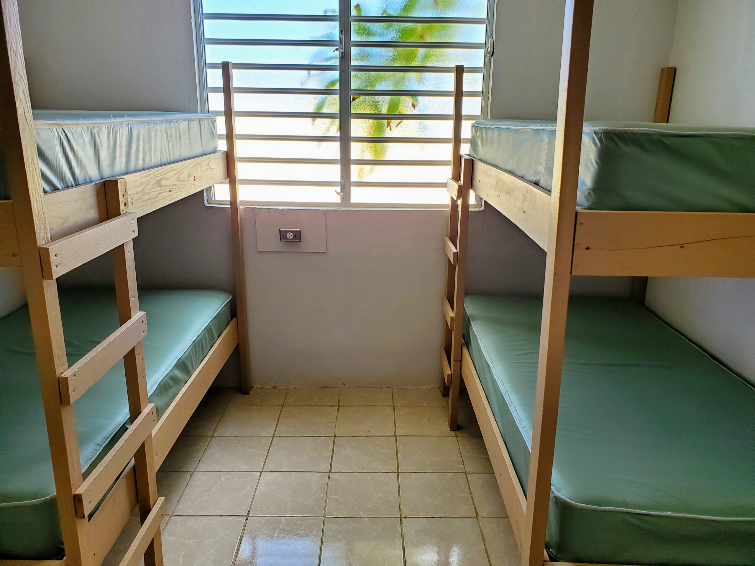 Bunk beds stand in a bedroom at the facility where the team will be staying.