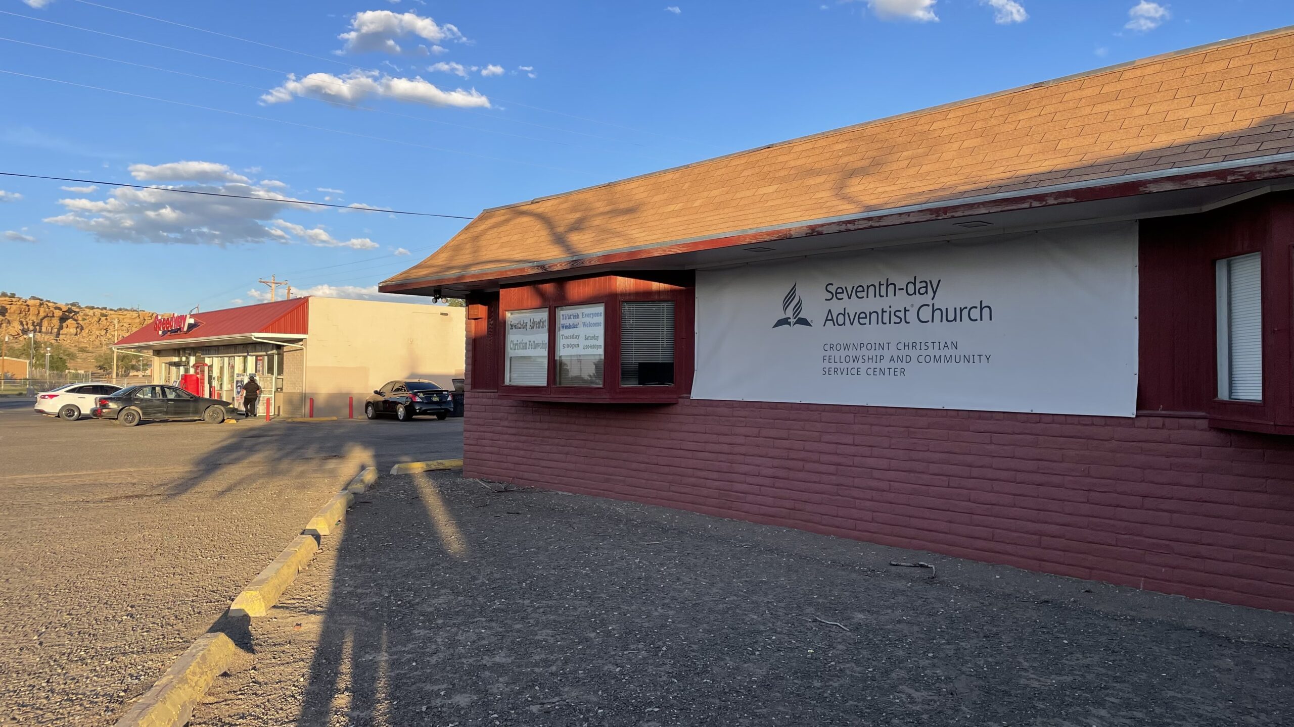 You will find the church behind the local gas station in town.